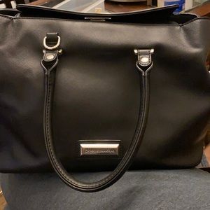 Black purse with top closure